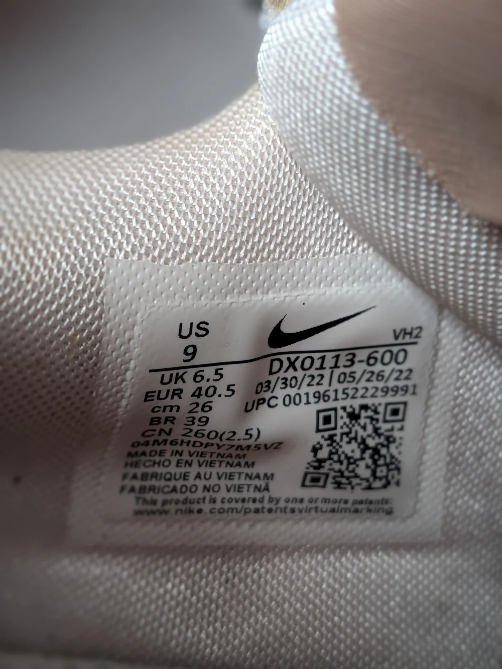 Nike Women’s Sneakers in Blush with Metallic Rose Accent